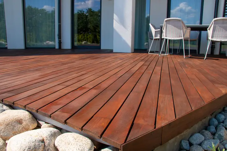 Modern house design with a wooden patio in Maryland.