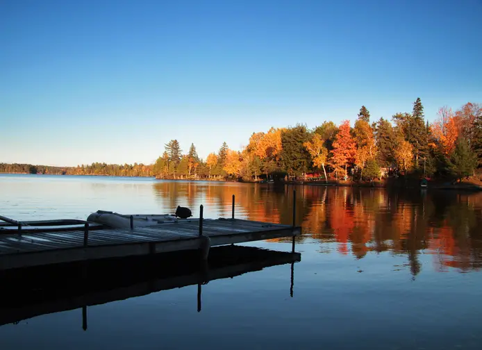 Private lake and dock in the fall season in Maryland