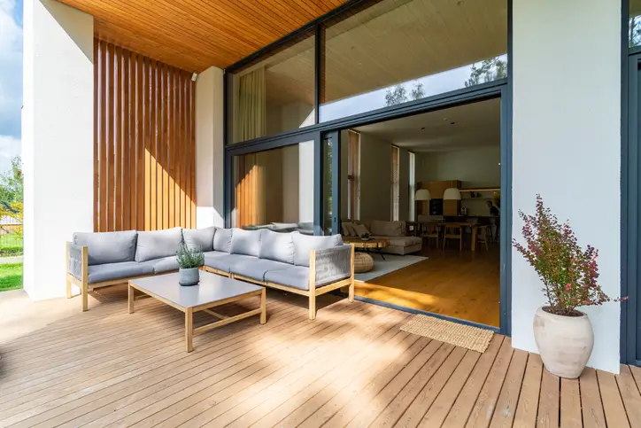 Wooden patio at the entrance of a modern Maryland home