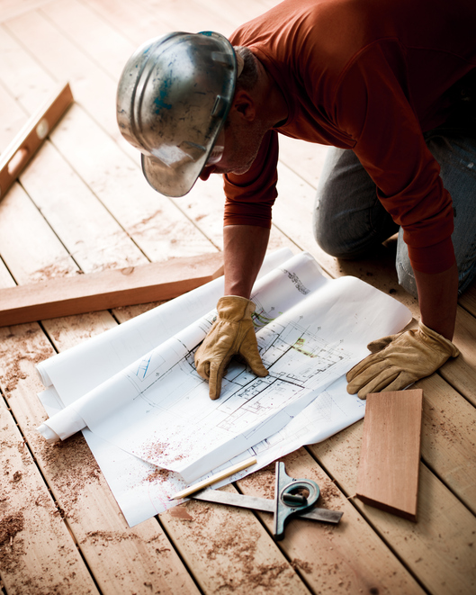 Contractor inspecting the deck building codes in Annapolis, MD